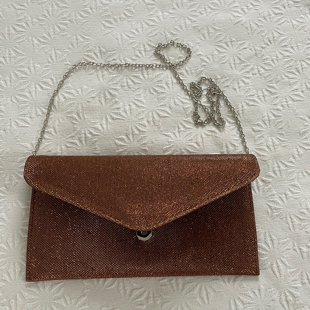 Cute little clutch for any occasion. New never used.